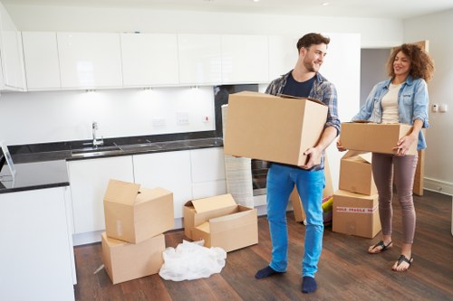 Organised moving day with boxes and furniture for Bowespark relocation